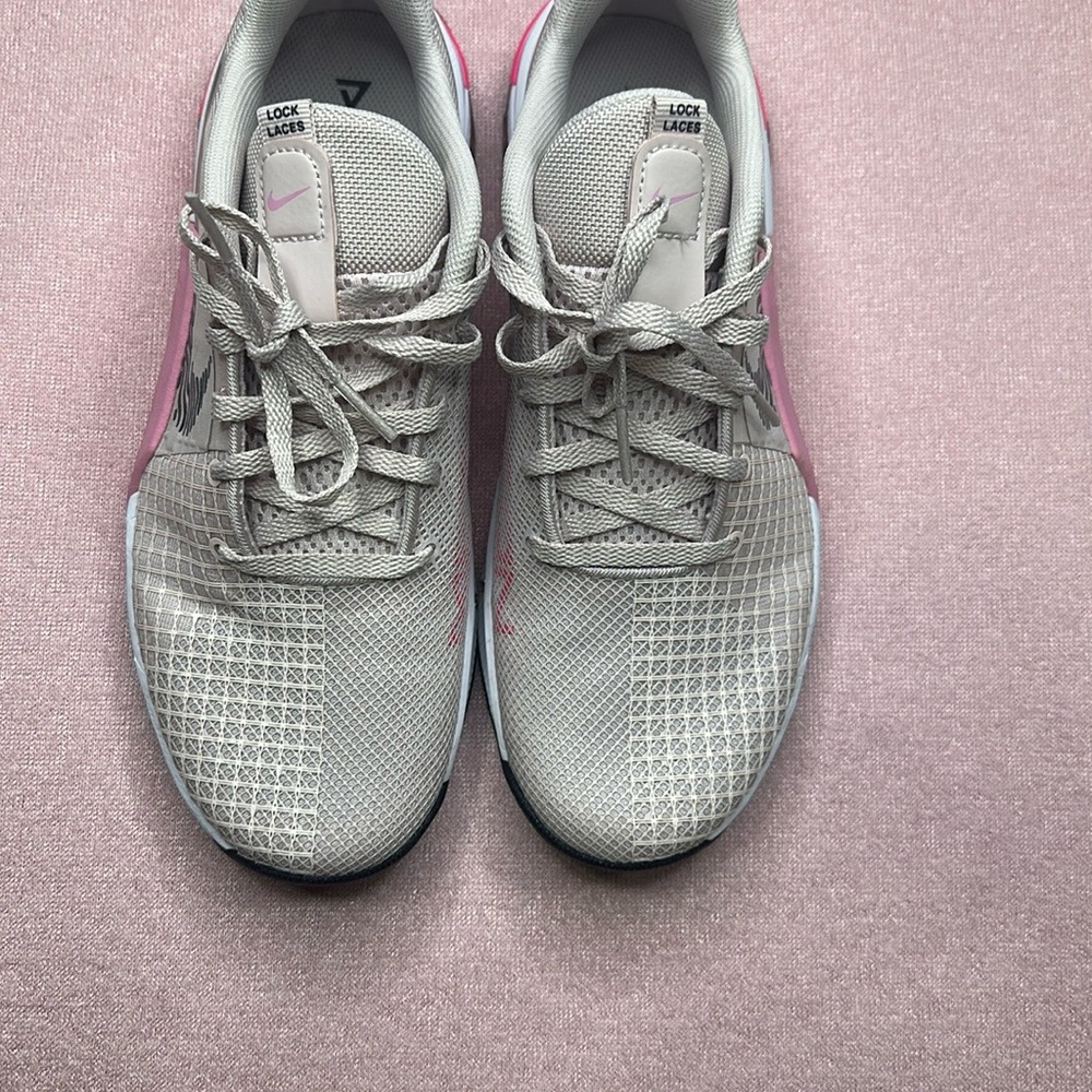 Nike Pink  Athletic Shoes Sleek Design.. used but like new